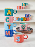 Multi alphabet stoneware mug 9cm height, imported from the UK
