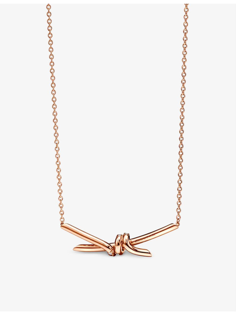 Tiffany & Co. 0.25ct diamond rose-gold knot pendant, imported from the UK