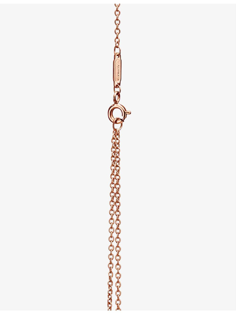 Tiffany & Co. 0.25ct diamond rose-gold knot pendant, imported from the UK