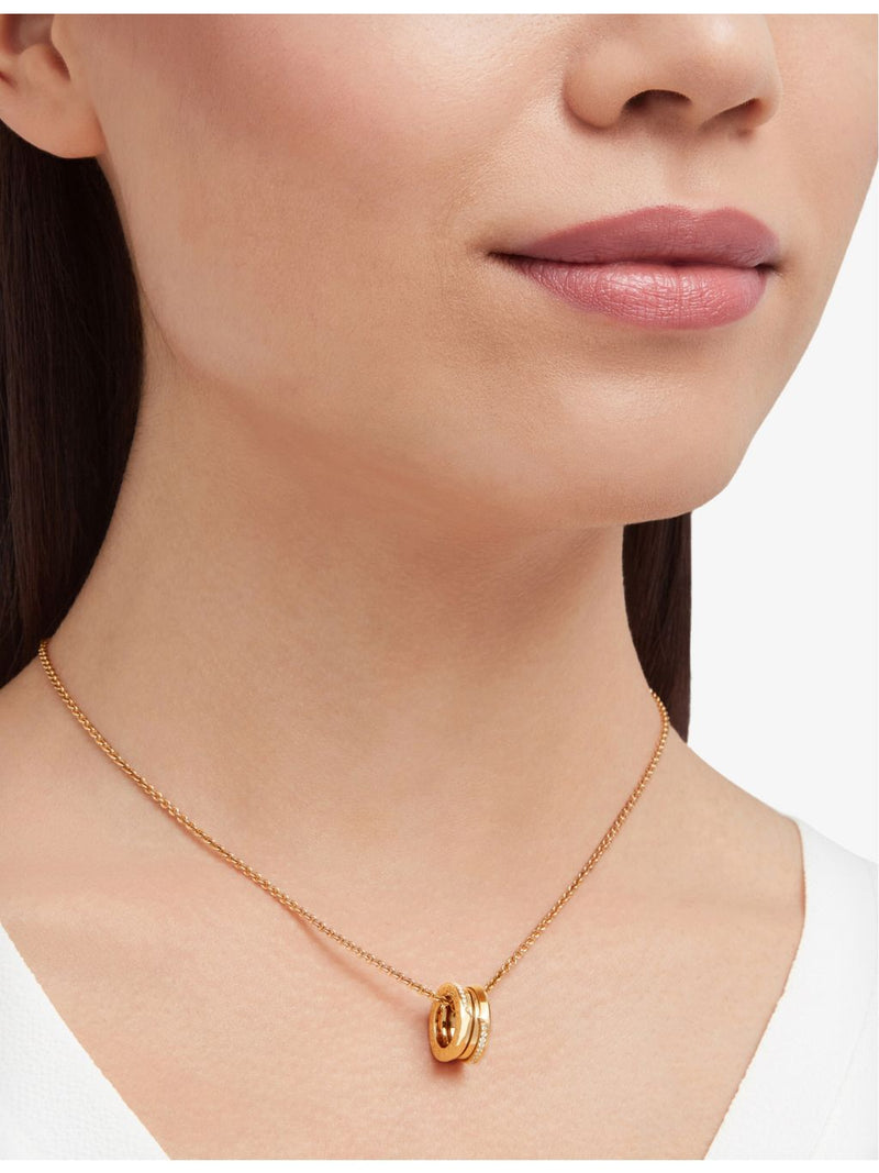 Bvlgari 18ct gold and diamond pendant necklace - British product