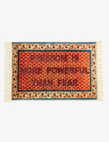 Seletti woven rug with graphic slogan 120x80, imported from the UK