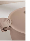 Our Place wrap-around silicone hot grips (British brand)