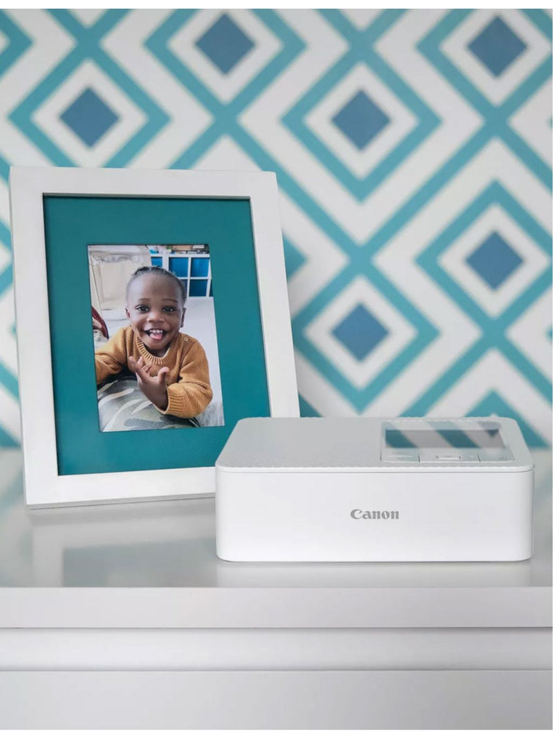 Canon Selphy CP1500 portable photo printer, 41-second prints - British product