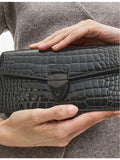 Aspinal of London Mayfair croc-effect leather clutch bag, UK version