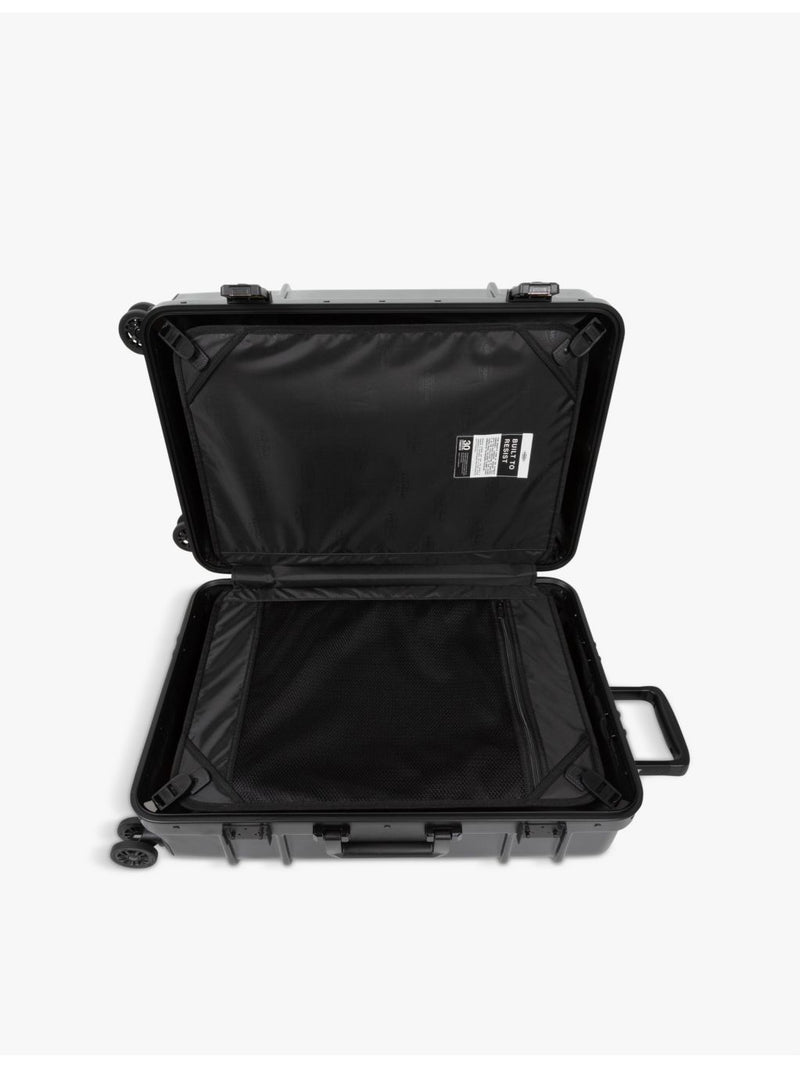 Eastpak hard-shell polycarbonate suitcase 78cm, imported from the UK