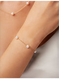 Yoko London 18ct gold and freshwater pearl bracelet, imported from the UK