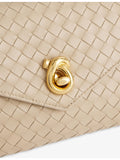 Bottega Veneta Knot Lock leather top-handle bag, imported from the UK