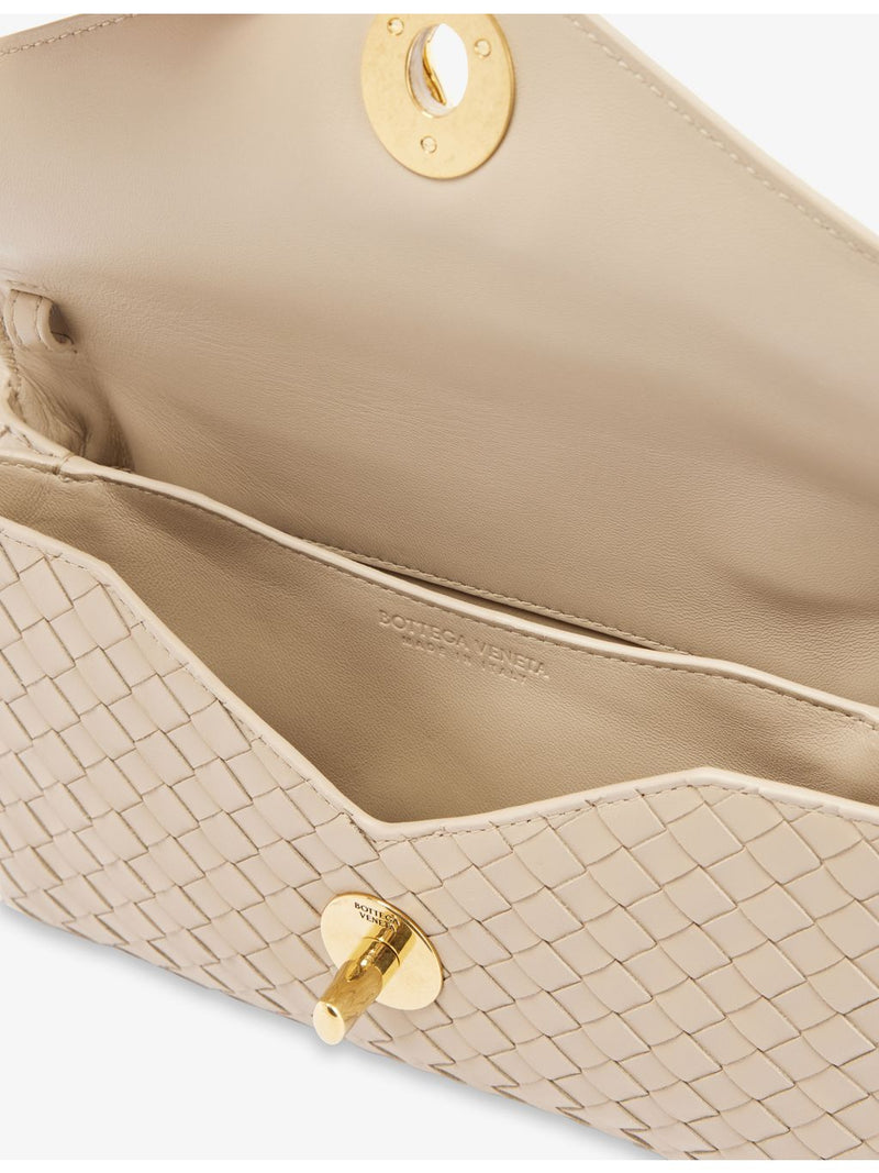 Bottega Veneta Knot Lock leather top-handle bag, imported from the UK