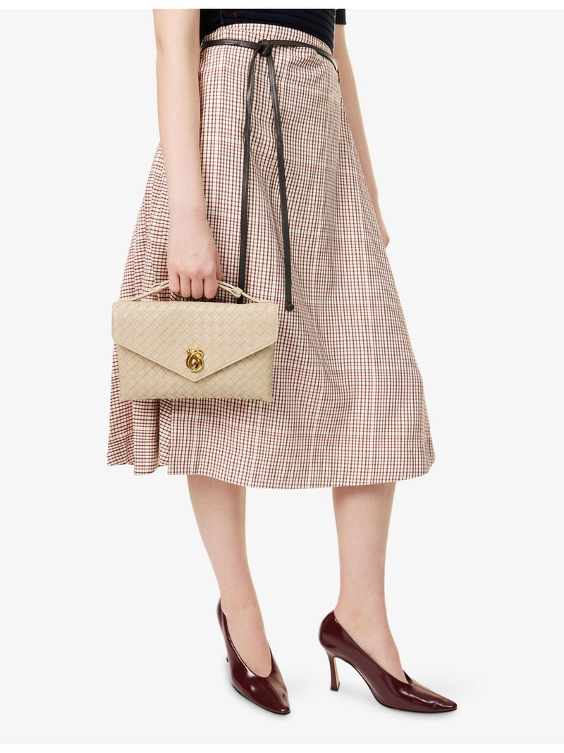 Bottega Veneta Knot Lock leather top-handle bag, imported from the UK