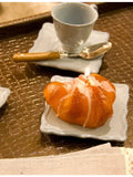 Introna wax candle croissant without icing 127g, UK version