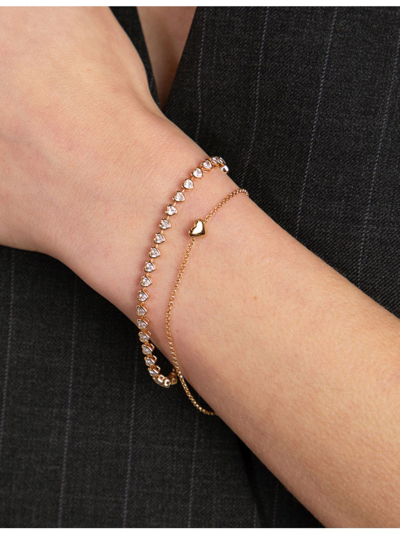 Astrid & Miyu heart bezel tennis bracelet in gold-plated brass, UK version