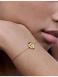 Monica Vinader initial P stamp 18ct yellow gold vermeil bracelet (British brand)