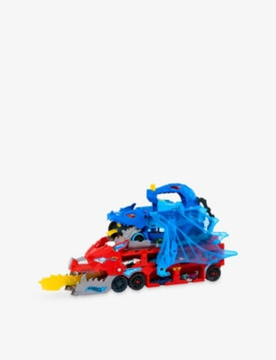 Hot Wheels dragon transporter playset with two cars, imported from the UK