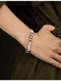 APM Monaco Up And Down sterling silver cubic zirconia bracelet (British brand)