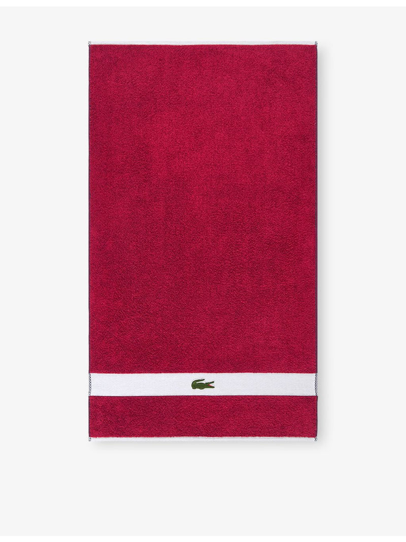 Lacoste cotton towel with woven stripe and crocodile logo - British product