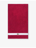 Lacoste cotton towel with woven stripe and crocodile logo - British product