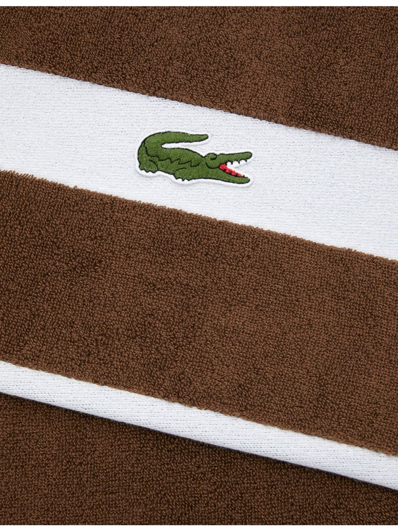 Lacoste cotton towel with woven stripe and crocodile logo - British product