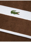 Lacoste cotton towel with woven stripe and crocodile logo - British product