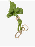 Maje leather bag charm with flower design and gold hardware (British brand)