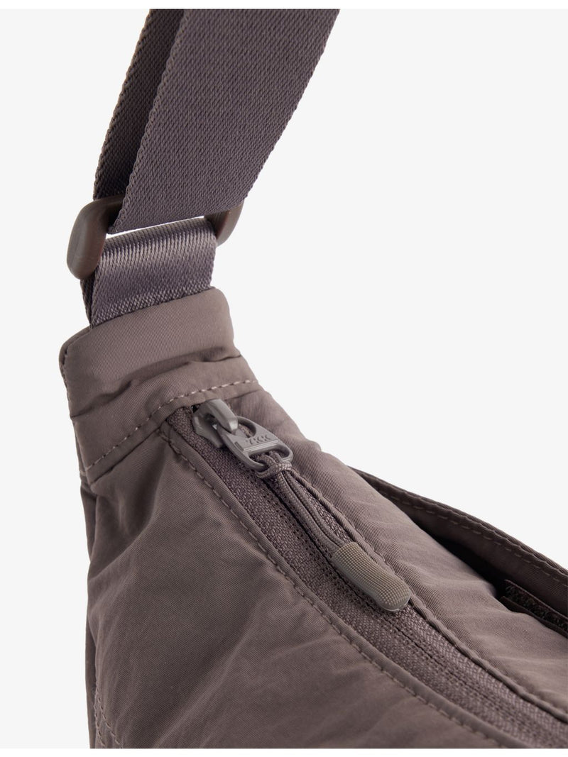 Gymshark pleat nylon crossbody bag with adjustable strap, UK version