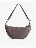 Gymshark pleat nylon crossbody bag with adjustable strap, UK version