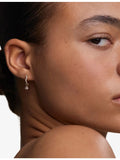 Astrid & Miyu crystal ripple pear charm huggie earrings, UK version
