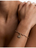 Astrid & Miyu gold-plated coin clip charm with cubic zirconia (British brand)