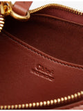 Chloé banana leather hobo bag with gold-tone hardware, imported from the UK
