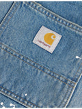 Carhartt WIP logo-patch paint-splatter denim tote, imported from the UK