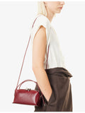 Café mini shoulder bag in python-print calf leather (British brand)