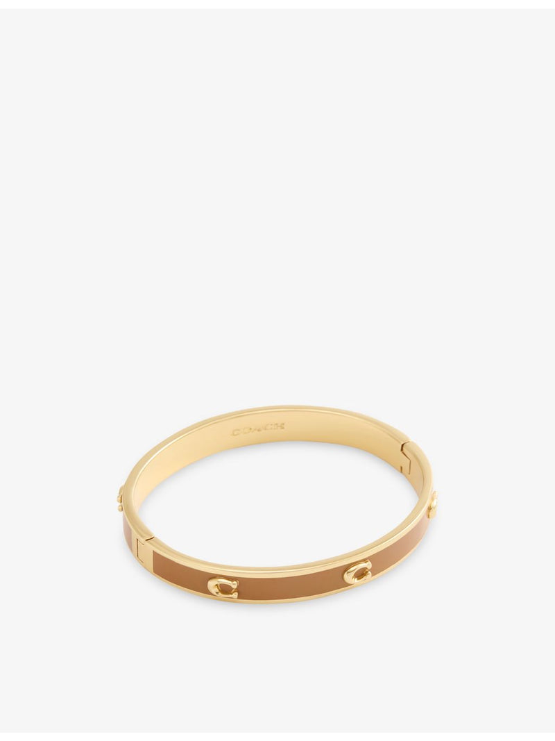 Coach gold-plated enamel bangle with cubic zirconia, UK version