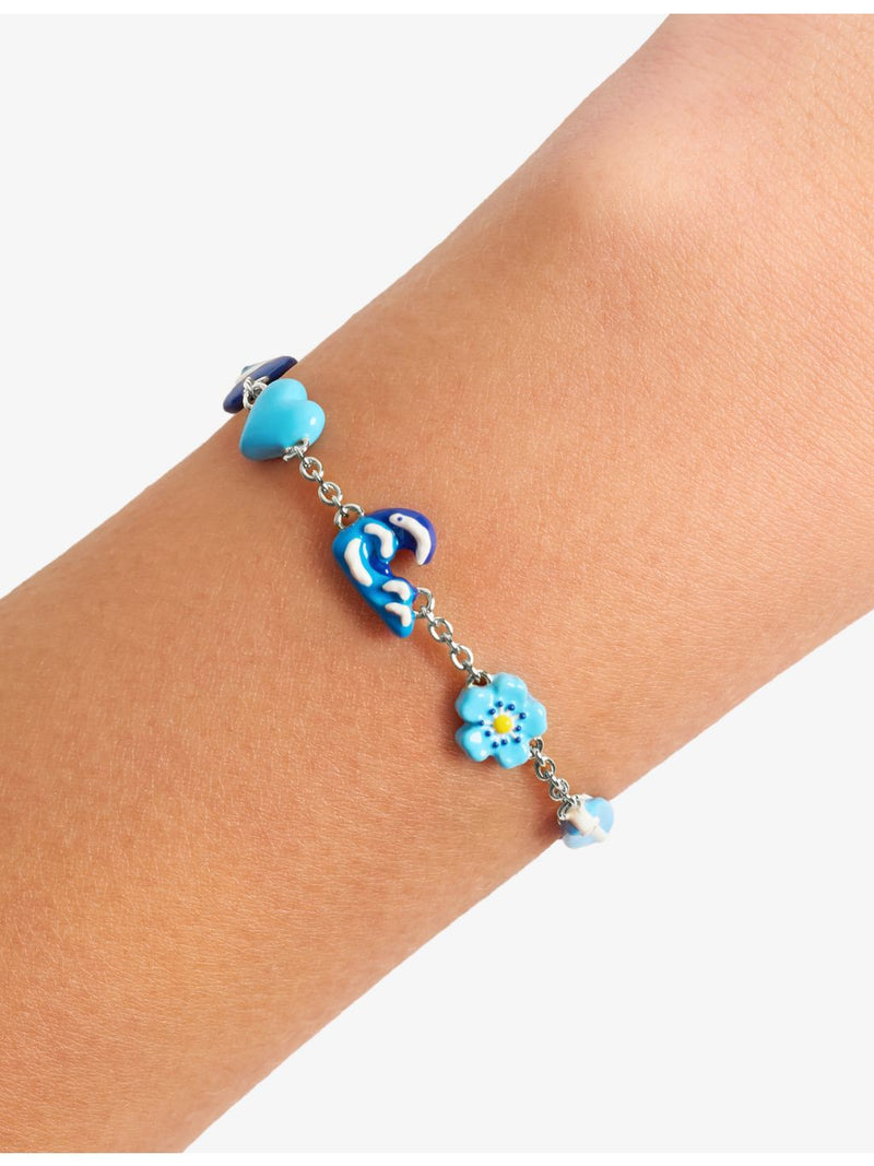 Poubel sterling silver charm bracelet with sea-inspired charms, imported from the UK