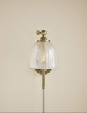 Ribbed plug in wall light with antique brass finish, imported from the UK