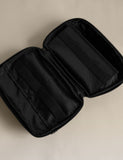 Rubberised travel tech organiser with compartments and secure zip fastenings, UK version