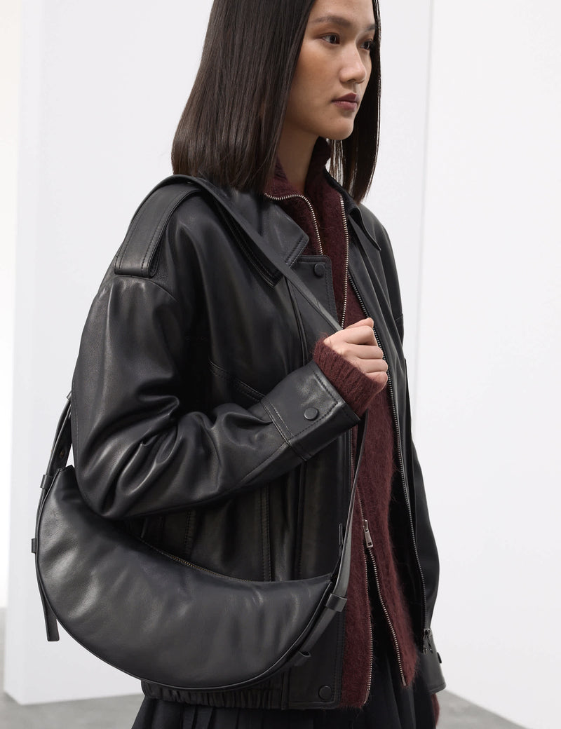Autograph leather sling bag with adjustable strap, UK version