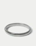 M&S silver tone stainless steel stretch bracelet, imported from the UK
