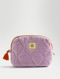 Small quilted toiletry bag with cotton exterior and tassel zip (British brand)