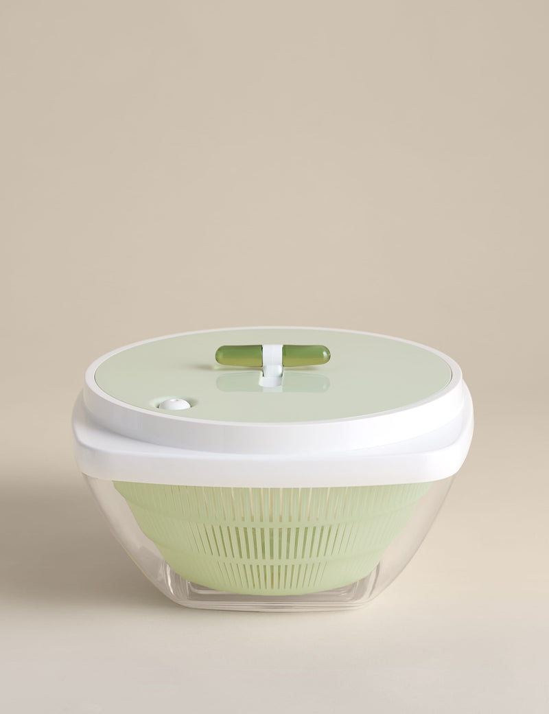 Salad spinner with one-handed sliding design, imported from the UK