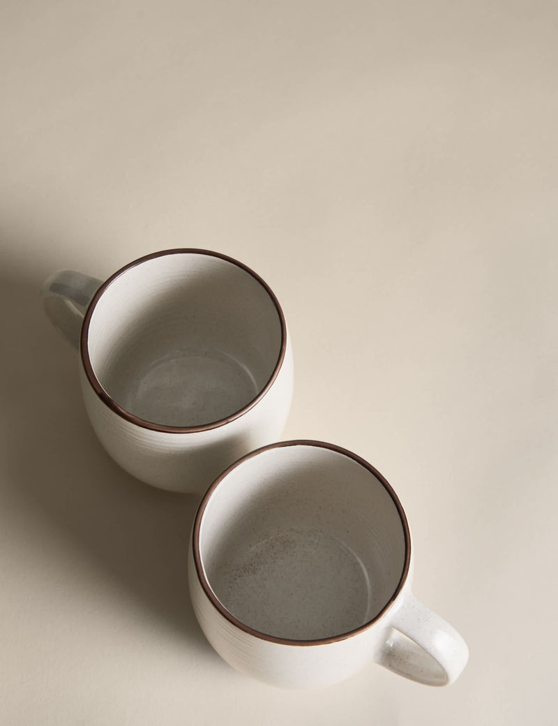 Set of four speckled ceramic mugs with contrast rims - British product