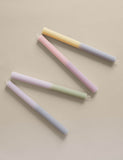 Set of 4 pastel dinner candles with ridged texture - British product