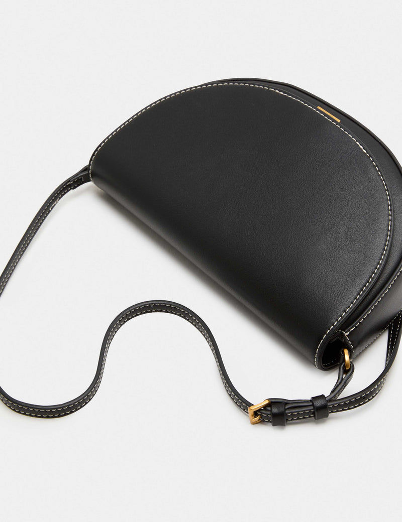 M&S shoulder bag with adjustable strap and compact design (British brand)