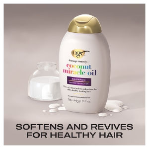 OGX Damage Remedy+ Coconut Oil Shampoo bottle 385ml, imported from the UK