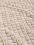George Home embossed grid throw in natural Moonbeam (British brand)