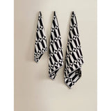 Black and white geometric cotton hand towel (British brand)