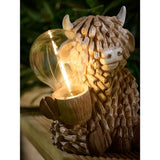 Brown Highland Cow solar light, hand-painted garden decor (British brand)