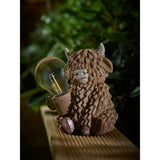 Brown Highland Cow solar light, hand-painted garden decor (British brand)