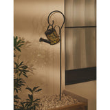 Black watering can solar stake light with warm white LEDs, imported from the UK