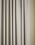 Textured herringbone eyelet curtains (British brand)