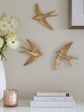 Set of 3 gold swallow wall art plaques (British brand)