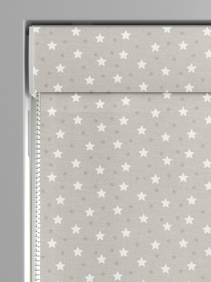 Roman blind with ditsy stars pattern in natural colour, imported from the UK